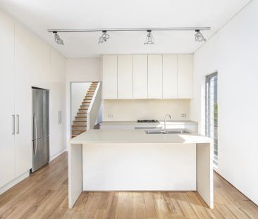 STUNNING COASTAL ARCHITECTURAL ABODE FLOODED IN NATURAL LIGHT - Photo 2