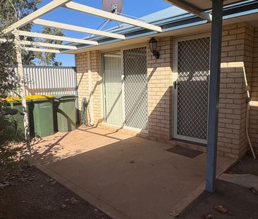 Tidy Unit in a Gated complex with sparkling pool! - Photo 2