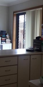 Charming 3 Bedroom Brick Home with Double Garage - Photo 3