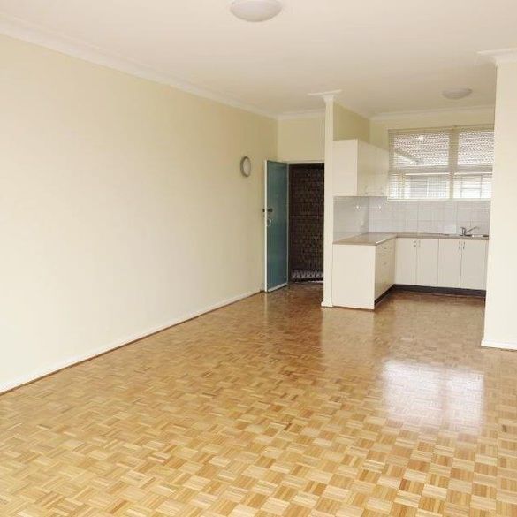 SUN BATHED GENEROUSLY PROPORTIONED IN PREMIER LOCATION! - Photo 1