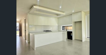 Stylish Brand-New 4-Bedroom Home in Prime Sunbury Position - Photo 3