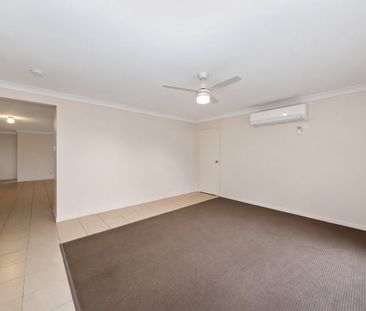 Spacious Family Home with Air-Conditioned Living & Large Backyard - Photo 3