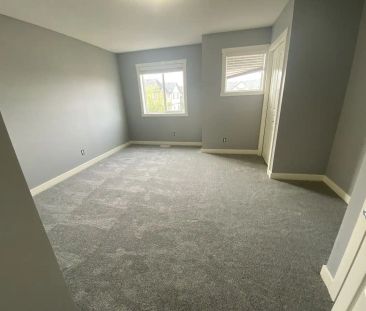 AVAILABLE Townhouse with 2 master bedroom ensuites with fully devel... - Photo 1