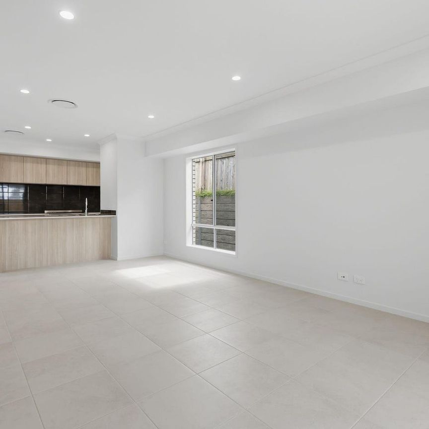 Brand New 4-Bedroom Home with Modern Comfort - Photo 1