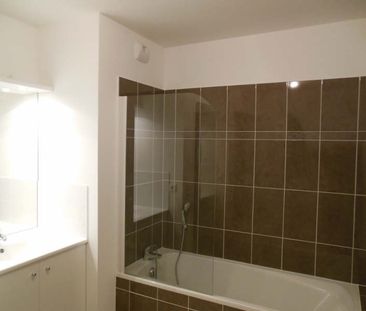 Location Appartement 3 pièces 68m² - Photo 3