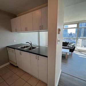 1 bd + den apartment for rent - Photo 2