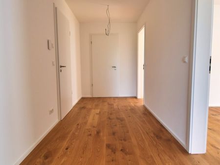 Exklusive Neubauwohnung mit Terrasse und Garten! 90qm, hochwertige Einbauküche, Parkett, Rolläden... - Photo 2