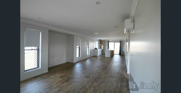 Neat & Modern Family Home in Prime Bundaberg East Location - Photo 1