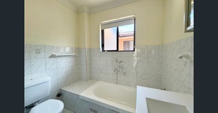 NEWLY RENOVATED - Spacious & Updated 2-Bedroom Unit in the Heart of Carlton - Photo 2