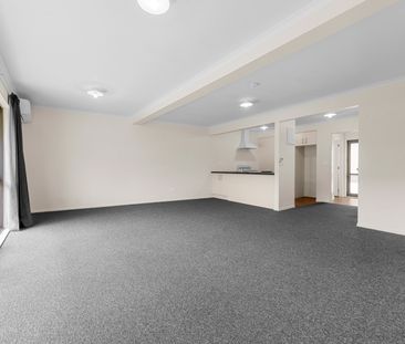 Discover comfortable and convenient living in this well-maintained ... - Photo 1