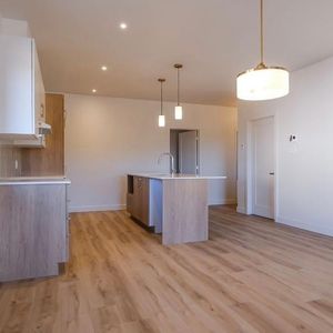 4 1/2 condo locatif neuf - Photo 2