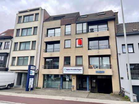 Centraal gelegen appartement met terras en autostaanplaats - Photo 4