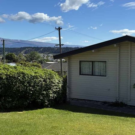 Spacious Family Home with Versatile Living Options - Photo 3