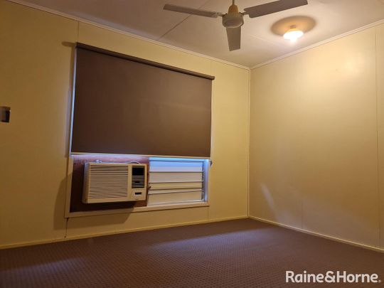 THREE BEDROOM HOME WITH AC THROUGHOUT AND DOUBLE BAY SHED - Photo 1