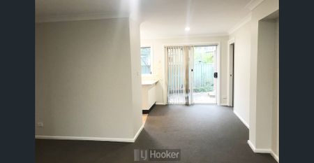 UPDATED THREE BEDROOM TOWNHOUSE BY THE LAKE! - Photo 2