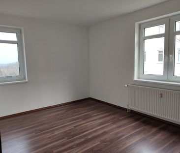 Gemütliche 2 Raumwohnung im Erdgeschoss mit Balkon ab 1. Januar 202... - Foto 3