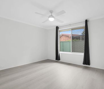 Refreshed three-bedroom home in quiet street - Photo 4