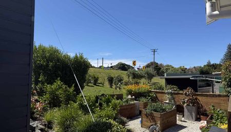 Coastal Charm Meets Family Comfort - Photo 2