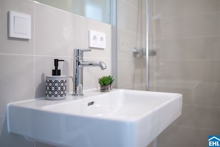 Exklusiver Erstbezug mit Rooftop Spa – Tower Homes im V22 - Photo 4