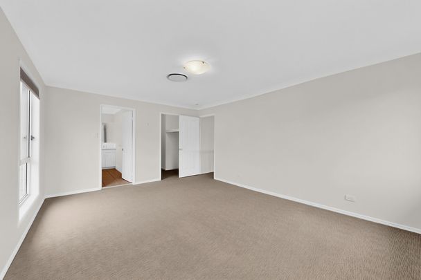 Spacious 5-Bedroom Family Home with Ducted Air and Media Room - Photo 1