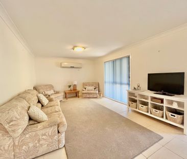 Experience Indoor Comfort and Outdoor Bliss! - Photo 1