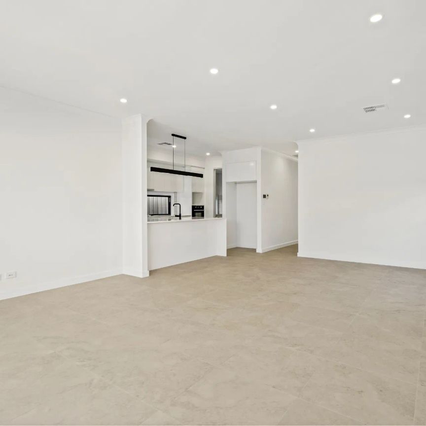 Brand New Four Bedroom Home Minutes from CBD - Photo 1