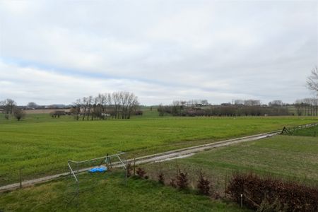 Vrijstaande woning op 705m² met mooie tuin, terras en landelijk uitzicht. - Foto 4