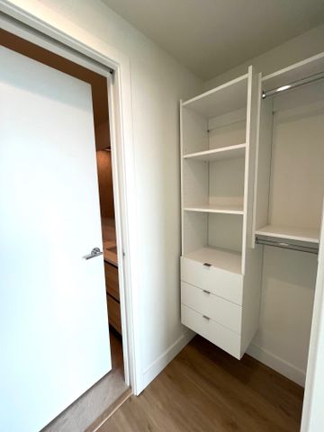 Beautiful 16th Floor Condo – BRAND NEW – WATER BY THE PARK - Photo 4