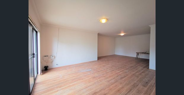 SPACIOUS 3-BEDROOM UNIT WITH CONVENIENT LOCATION - Photo 1