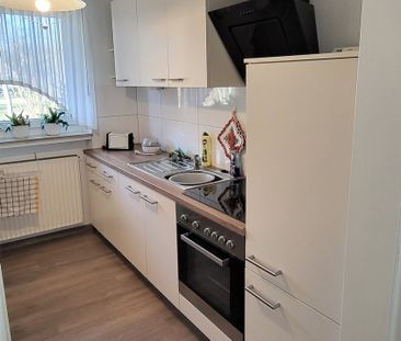 Erdgeschosswohnung mit Einbauküche und Terrasse! - Foto 1