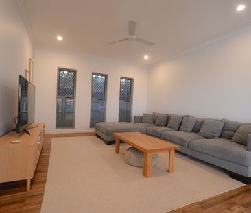 Spacious 4-Bedroom Home with In-Ground Pool - Photo 4