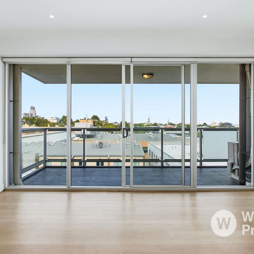 City Views, Large Balcony & Spacious Living in Prime North Melbourne - Photo 1