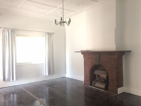 1920's Charisma with Lawn Maintenance Included! - Photo 3