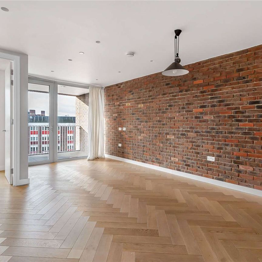 One-bedroom apartment with a private balcony. - Photo 1