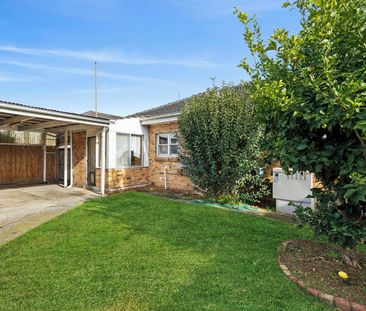 Solid Gem in Prized McKinnon Secondary School Zone - Photo 1