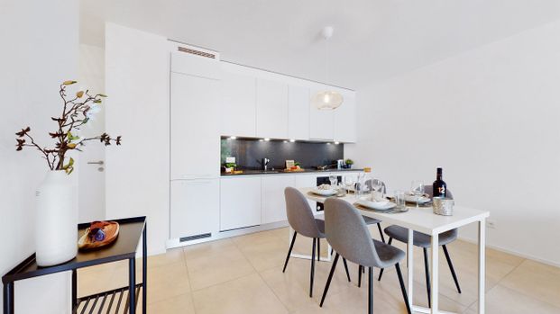 Ultimo piano con stile: moderno 3.5 locali nella residenza Parco Cornaredo - Foto 1