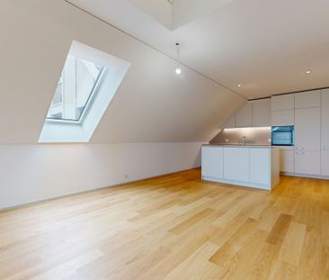 Modern new construction apartment in the center of Niederhasli - Photo 1