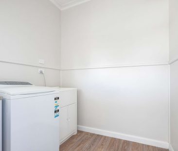 TASTEFULLY RENOVATED THREE BEDROOM HOME - Photo 6