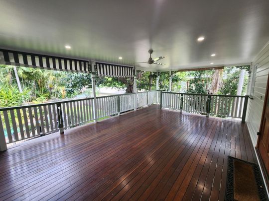 Charming Queenslander Home with Modern Upgrades in Hermit Park - Photo 1