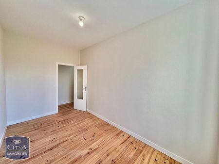 Location Appartement 4 pièces 65m² ST ETIENNE 42000 - Photo 2