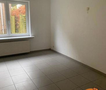 Gelijkvloersappartement met tuintje en autostaanplaats - Foto 1