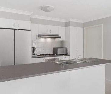 Four Bedroom House with Ducted AC! - Photo 4