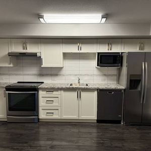 ***Spacious One Bedroom Legal Suite*** - Photo 2