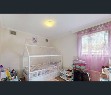 Three-Bedroom Unit with Double Garage & Private Courtyard - Photo 6