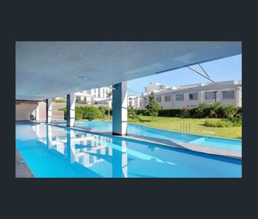 Fully furnished one-bedroom apartment with water views Oct - Photo 5