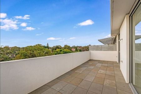 Dual Facing Two-Bedroom Penthouse | Stylish Living in Vibrant Newtown - Photo 3