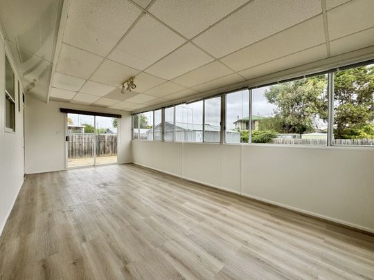 Updated Home with Spacious Yard and Prime Location - Photo 1