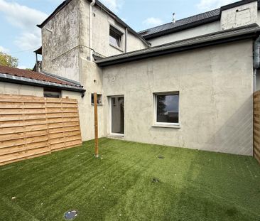 Gelijkvloersappartement met tuin en 2 slaapkamers! - Photo 2