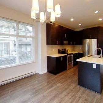 Bright and Spacious 4 Bedroom Corner Unit Townhouse in an Exceptional - Photo 1