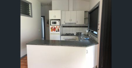 Conveniently Located Unit with Flexible Furnishing Options - Photo 5